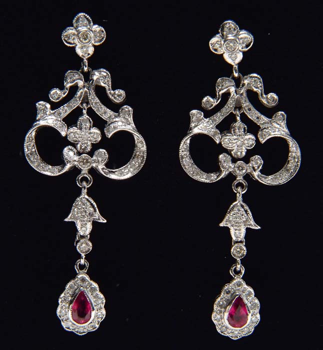 Appraisal: RUBY DIAMOND EARRINGS Elegant kt white gold dangle earrings are