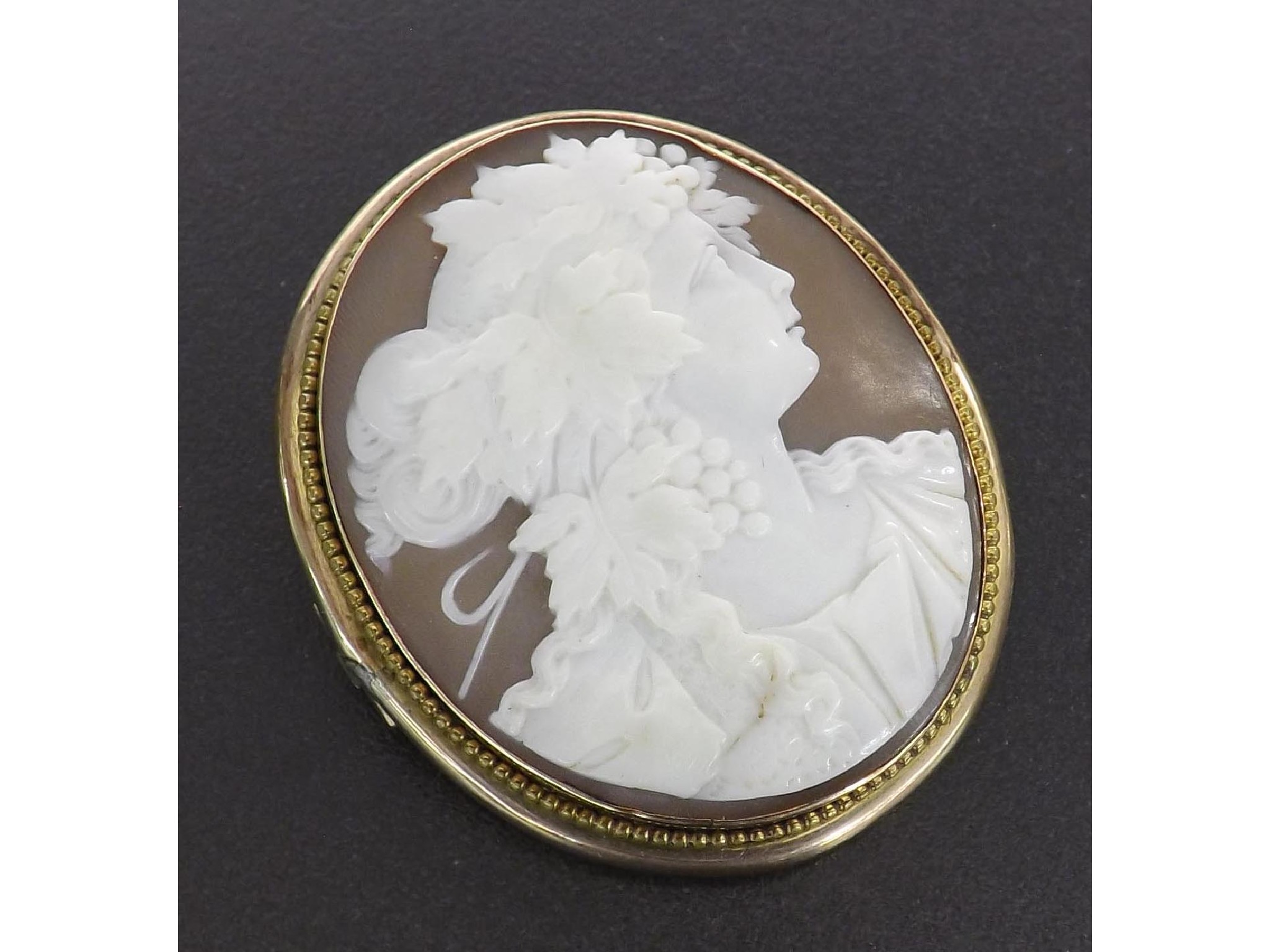 Appraisal: Victorian oval shell cameo brooch depicting a portrait of a