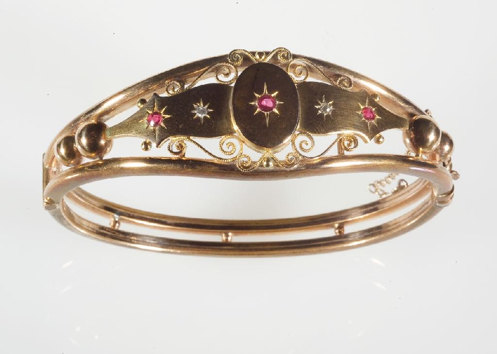 Appraisal: LATE VICTORIAN GOLD AND DIAMOND BANGLE c the upper section