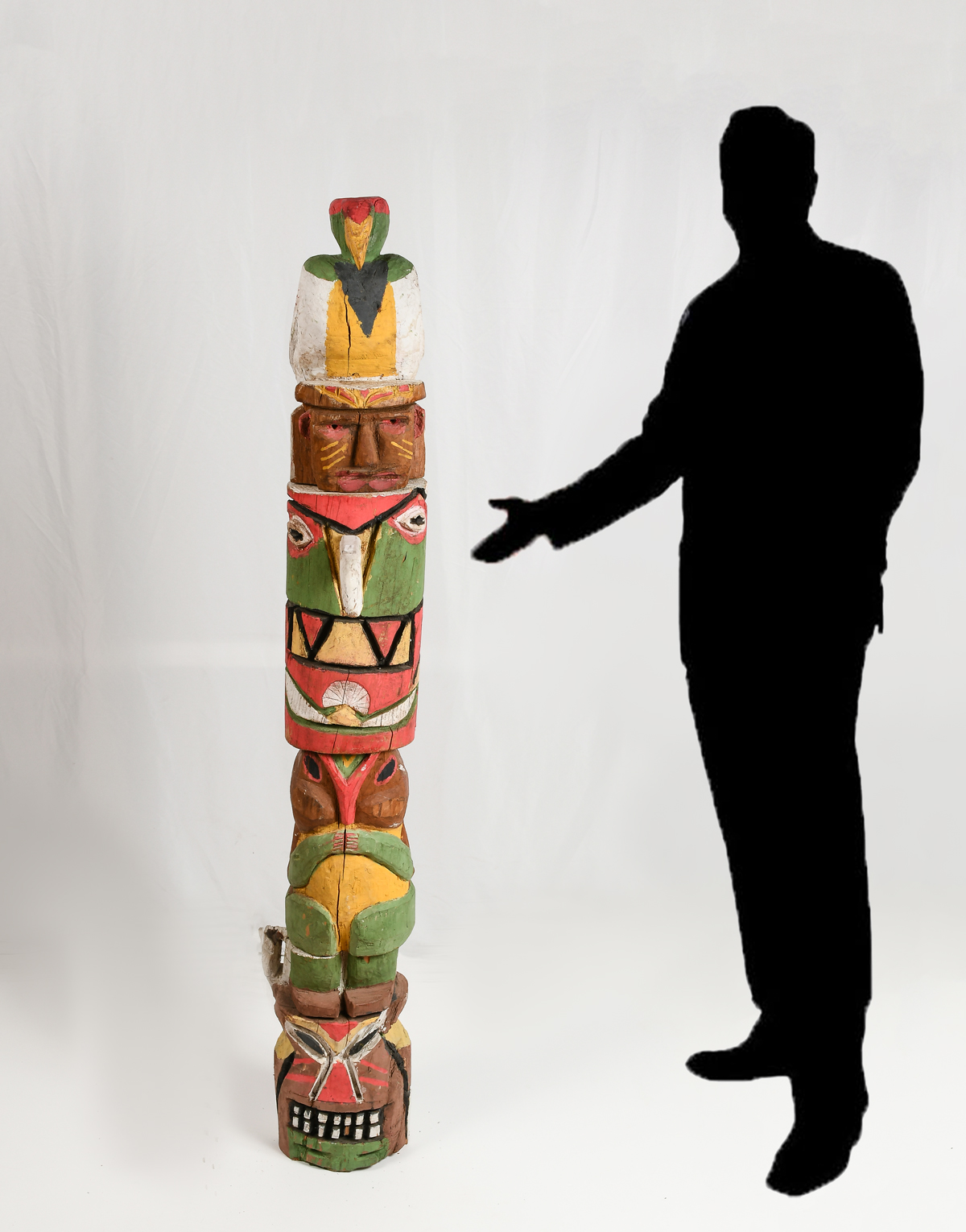 Appraisal: CARVED AND PAINTED THREE SECTION WOOD TOTEM '' in height