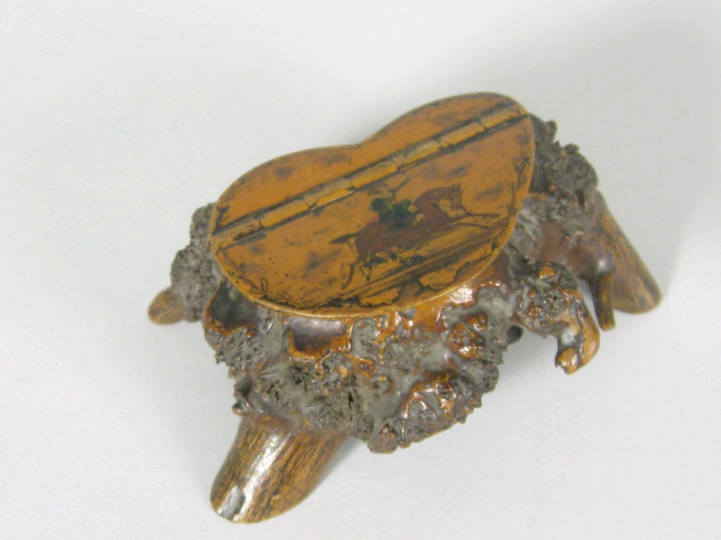 Appraisal: An Irish bog root Snuff Box the lid decorated figure