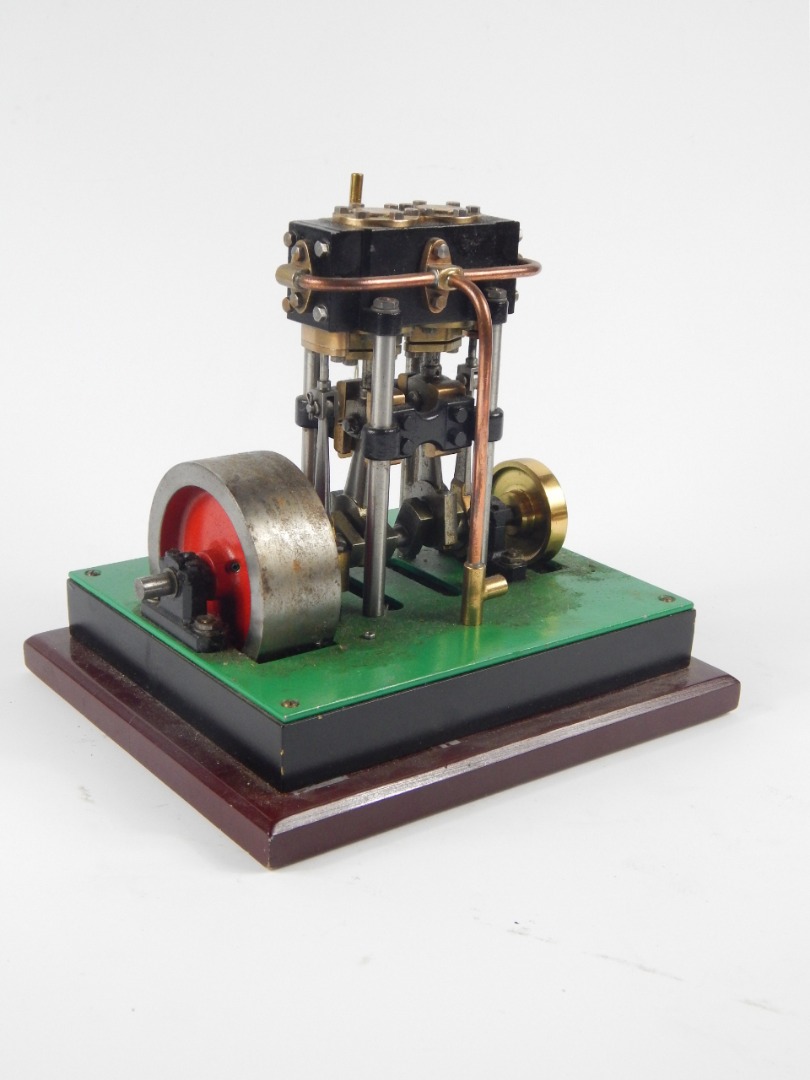 Appraisal: A partial horsepower live steam table top metal engine with