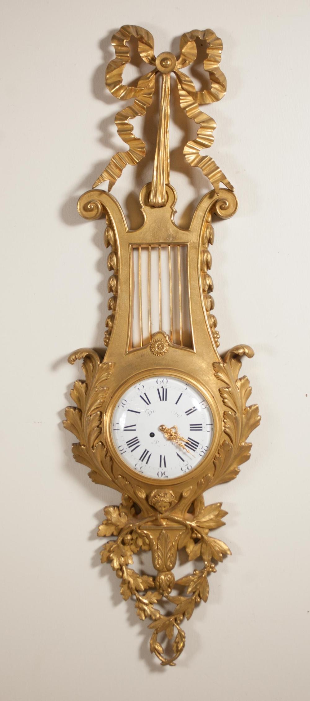 Appraisal: LOUIS XV STYLE GILT BRONZE LYRE-CASE WALL CLOCK Vincenti Cie