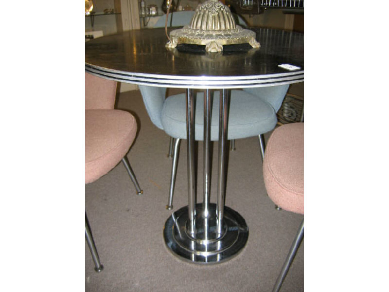 Appraisal: ART DECO CIRCULAR TABLE with round black wood top raised