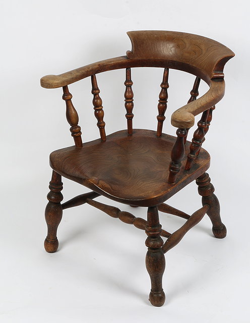 Appraisal: AN ANTIQUE ASH AND ELM CAPTAINS CHAIR bobbin turned spindle