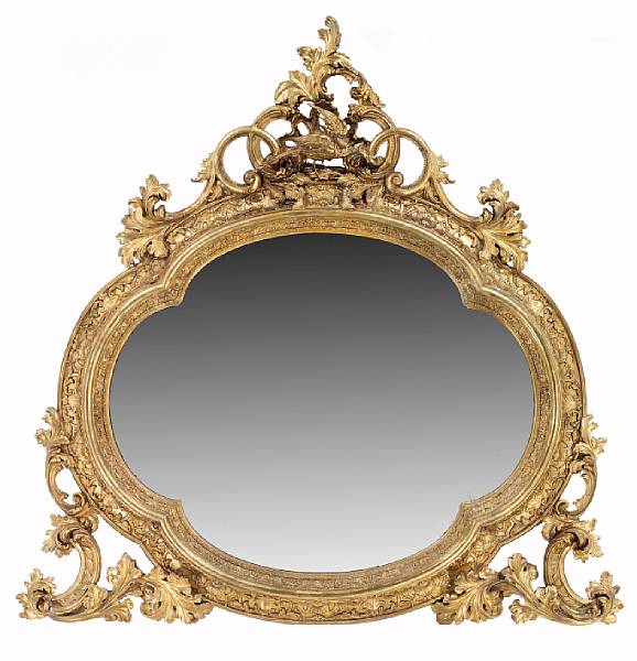 Appraisal: A Continental Rococo style giltwood and composition overmantel mirrorthird quarter