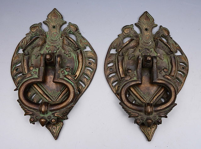 Appraisal: A PAIR OF INDIAN HEAVY BRONZE DOOR KNOCKERS with ring