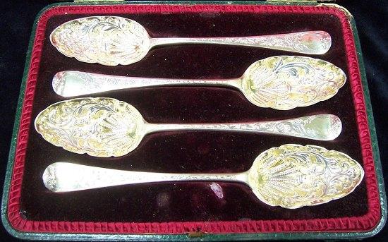 Appraisal: Four Georgian berry spoons with embossed bowls various dates in