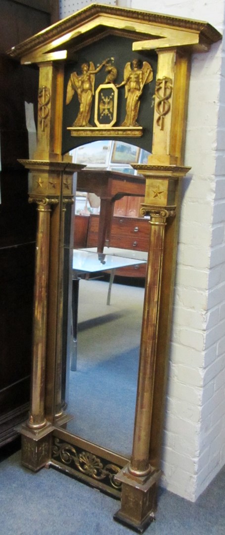 Appraisal: A early th Swedish Empire gilt framed wall mirror with