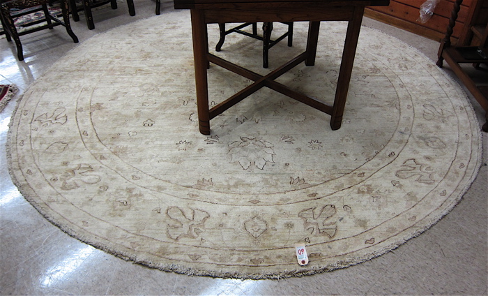 Appraisal: ROUND ORIENTAL CARPET Oushak design of West Anatolia hand knotted