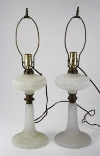 Appraisal: pr of ribbed clambroth oil lamps with brass rings ht