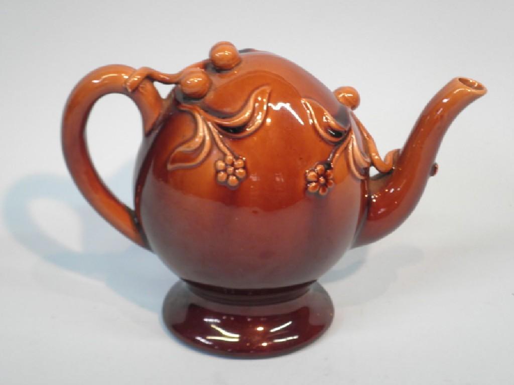 Appraisal: A thC Spode treacle glazed Cadogan teapot applied with flowers