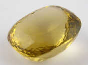 Appraisal: A citrine paper weight measuring approx x x mm and