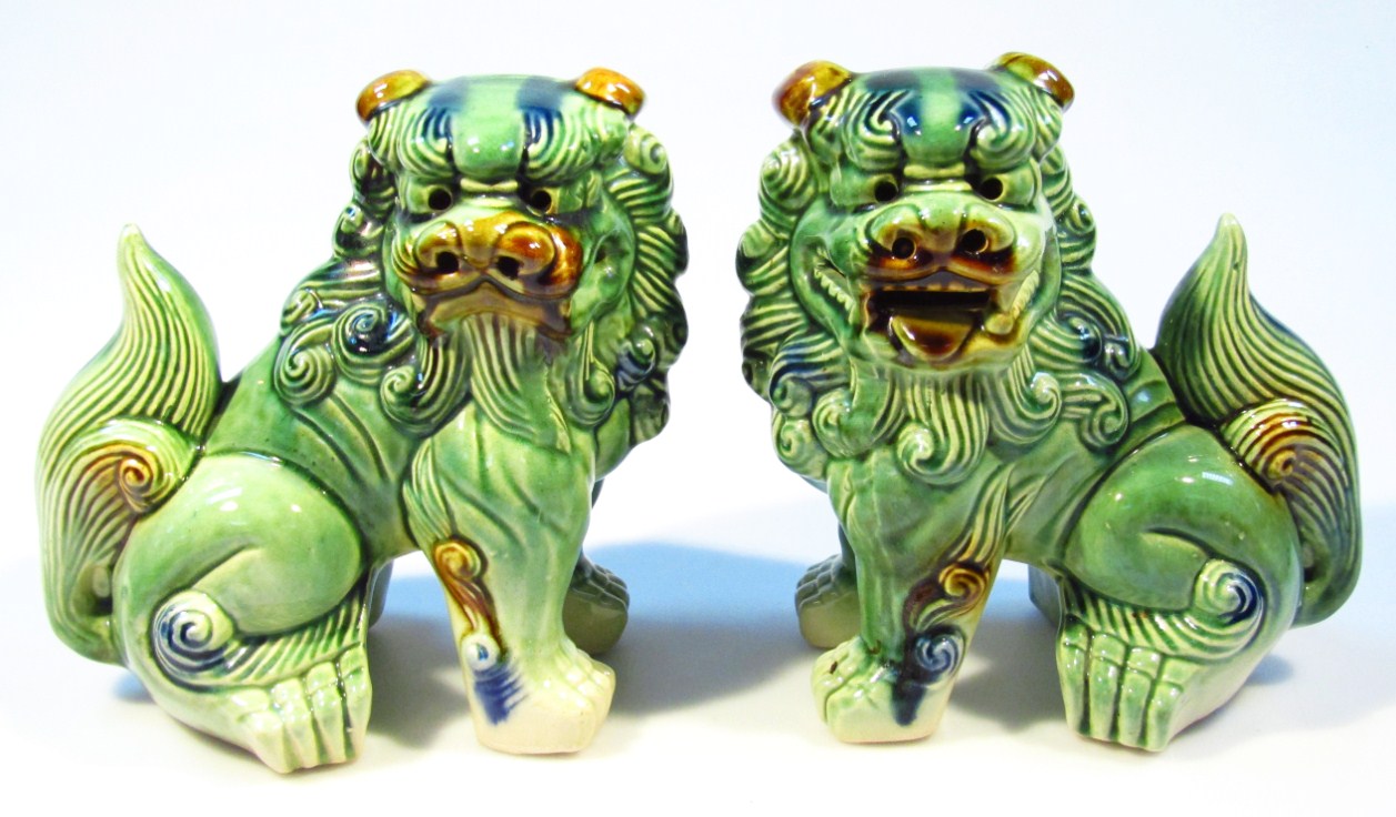 Appraisal: A pair of Chinese pottery Dogs of Fo each polychrome