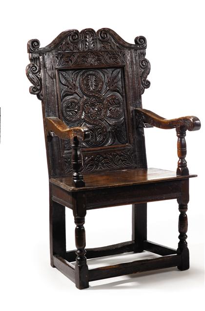 Appraisal: English oak armchair th century The S-scroll top and back