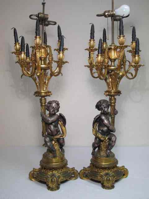 Appraisal: Pair of antique seven arm candelabra lamps Fitted for electricity