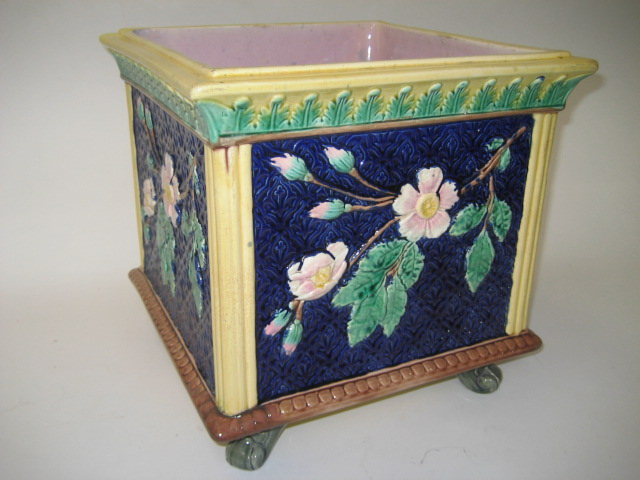 Appraisal: A MAJOLICA JARDINIERE of plain square section raised upon four