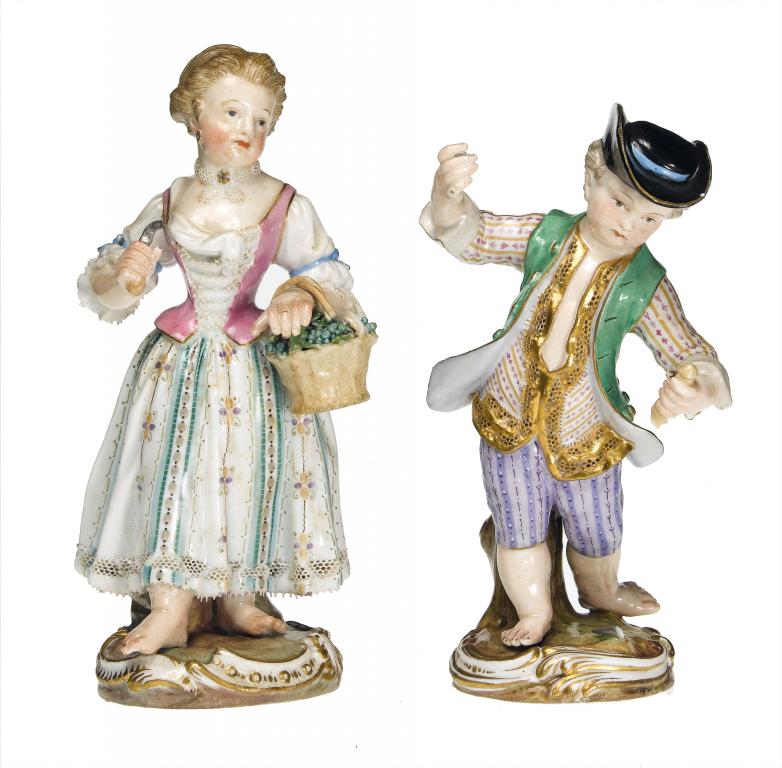 Appraisal: TWO MEISSEN FIGURES OF A BOY AND GIRL the boy