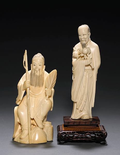 Appraisal: Two tinted ivory figural carvings th Century The first of