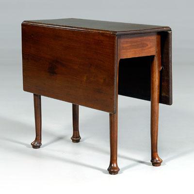 Appraisal: Irish Queen Anne drop-leaf table mahogany with oak secondary lambrequin