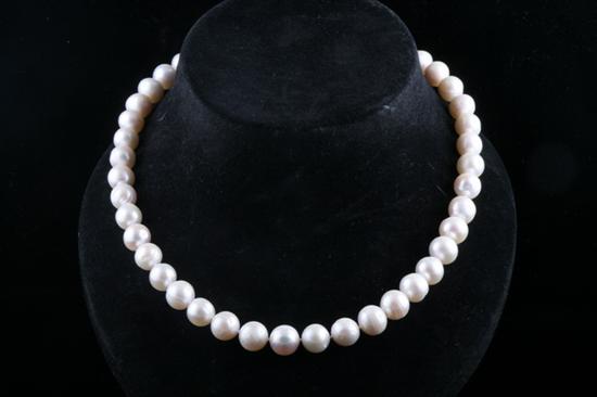 Appraisal: BAROQUE CULTURED PEARL NECKLACE Forty two mm- mm white pearls