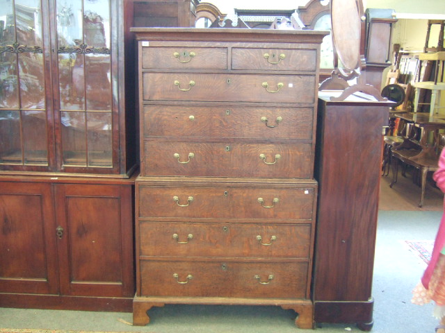 Appraisal: A George III oak chest on chest the plain cornice