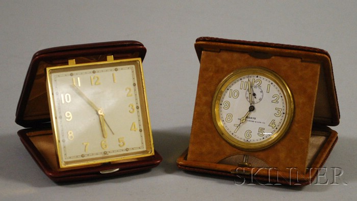 Appraisal: Two Leather-cased Travel Alarm Clocks an Angelus and one retailed