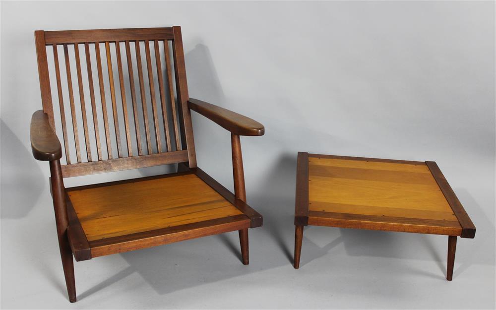 Appraisal: GEORGE NAKASHIMA WALNUT SLAT-BACK ARMCHAIR AND OTTOMAN with shaped arms