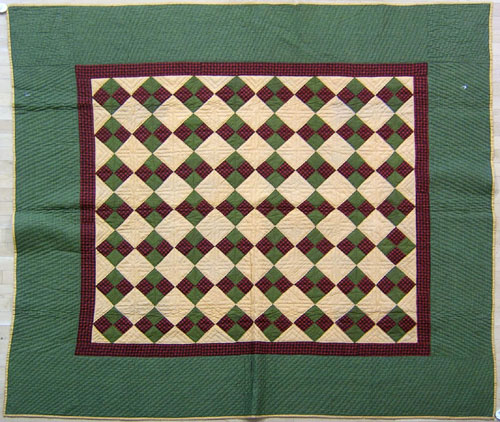 Appraisal: Pieced quilt th c in a diamond pattern x