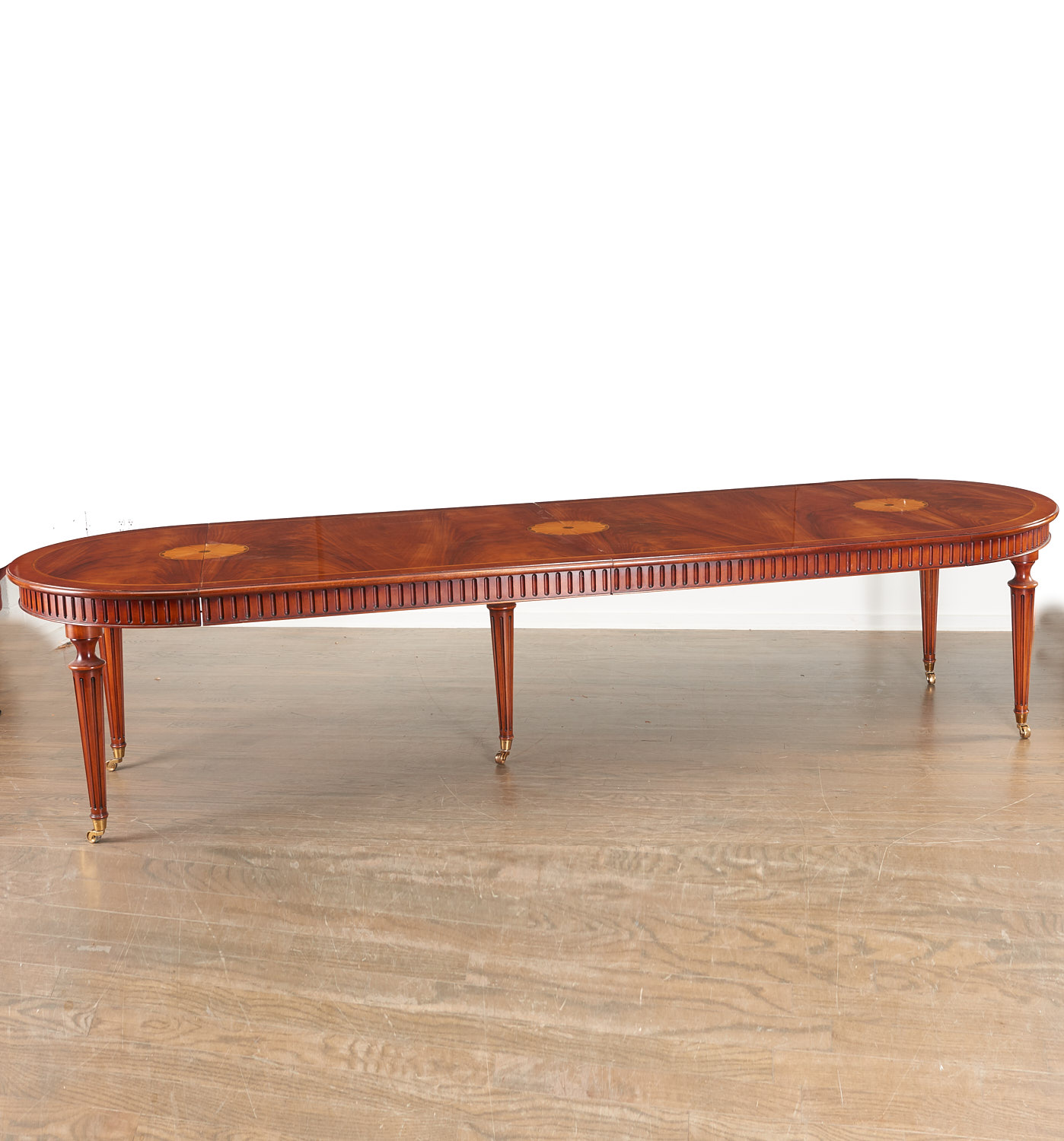 Appraisal: LOUIS XVI STYLE MAHOGANY EXTENSION DINING TABLE th c retailed