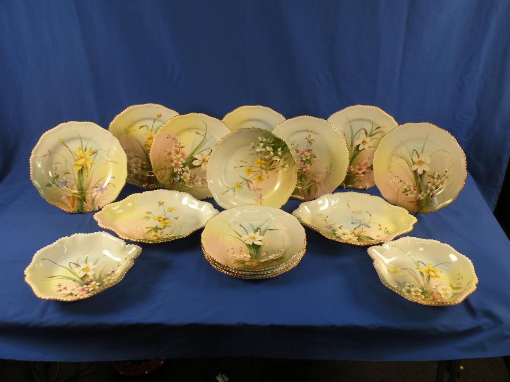 Appraisal: A Royal Worcester dessert service each piece hand painted with