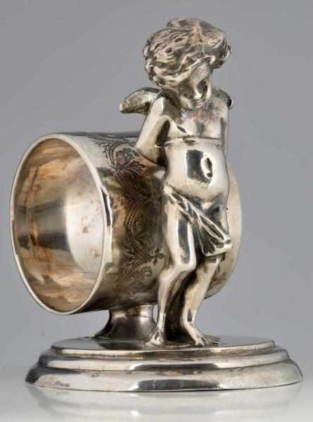 Appraisal: Bashful Angel Figural Napkin Ring Angel stands in front of