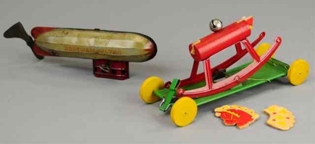 Appraisal: ZEPPELIN AND HORSE BELL TOY Both tin includes ''Hopewell Flyer