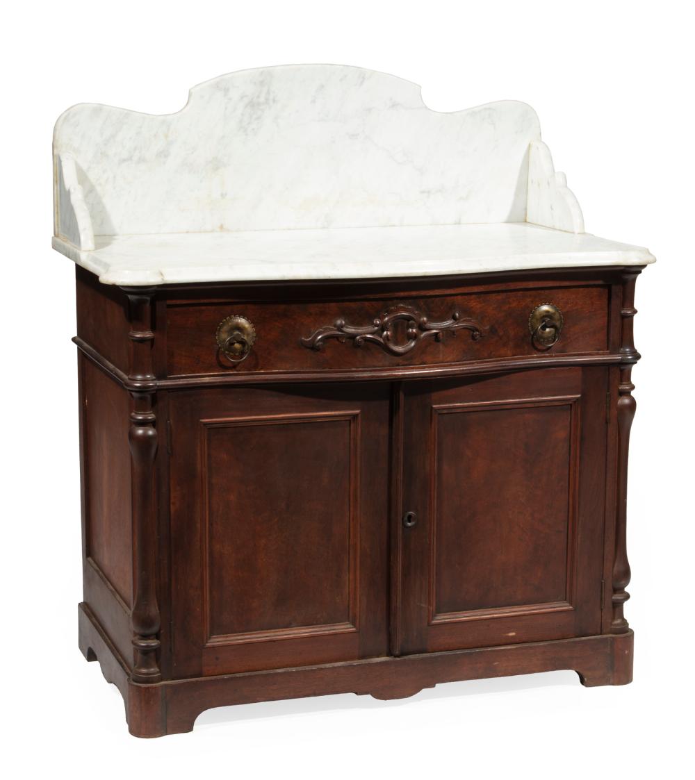 Appraisal: American Rococo Mahogany Washstand c marble top and shaped backsplash