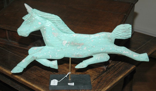 Appraisal: A PAINTED WOOD WEATHER VANE Carved as a horse raised