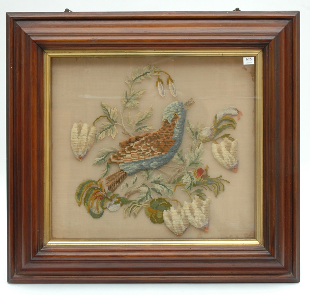 Appraisal: A VICTORIAN WOOLWORK TAPESTRY Depicting a bird amongst foliage in