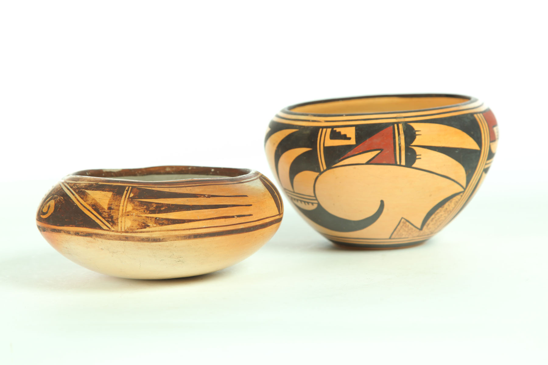 Appraisal: TWO AMERICAN INDIAN POTS Twentieth century Hopi bowls with designs