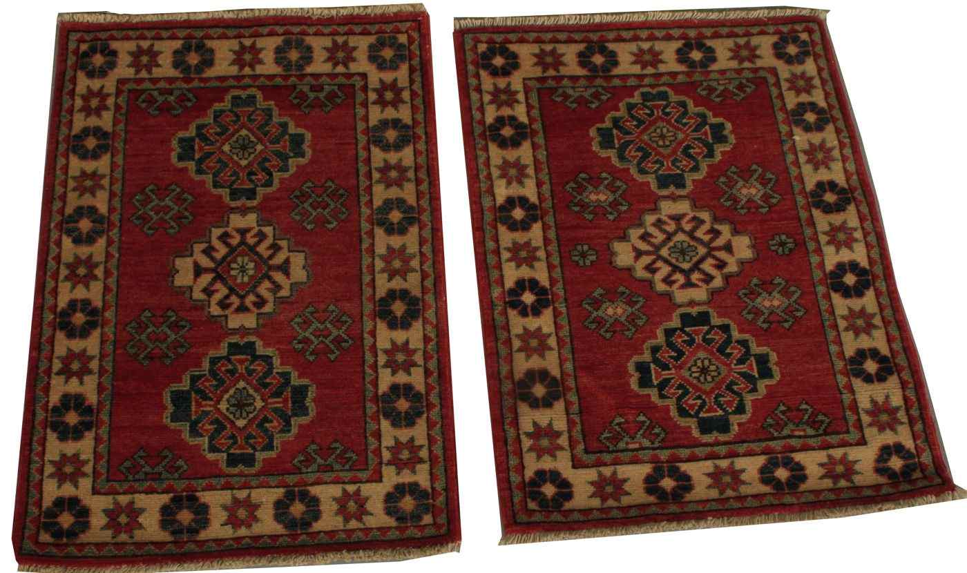 Appraisal: ORIENTAL RUG PAIR OF KAZAK-DESIGN MATSEach approximately ' x '