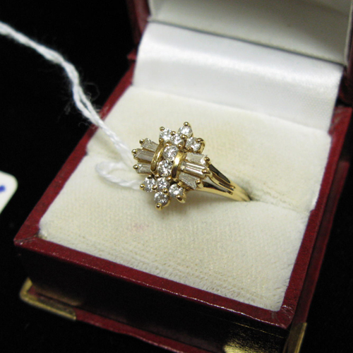 Appraisal: DIAMOND AND EIGHTEEN KARAT GOLD CLUSTER RING set with round