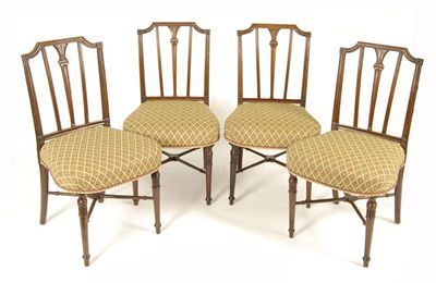 Appraisal: Four George III mahogany dining chairs with triple vertical splat