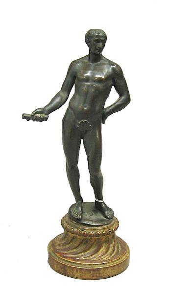 Appraisal: A patinated bronze figure of a male nude late th