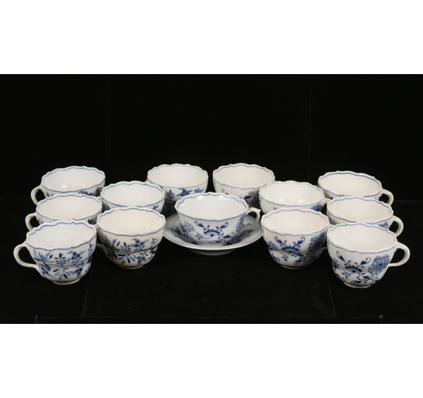 Appraisal: Twelve Meissen Blue Onion porcelain cups and also one cup