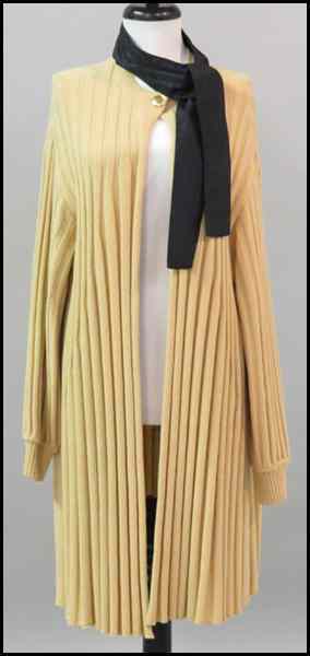 Appraisal: GIANFRANCO FERRE TAN RIBBED WOOL SWEATER COAT With a black