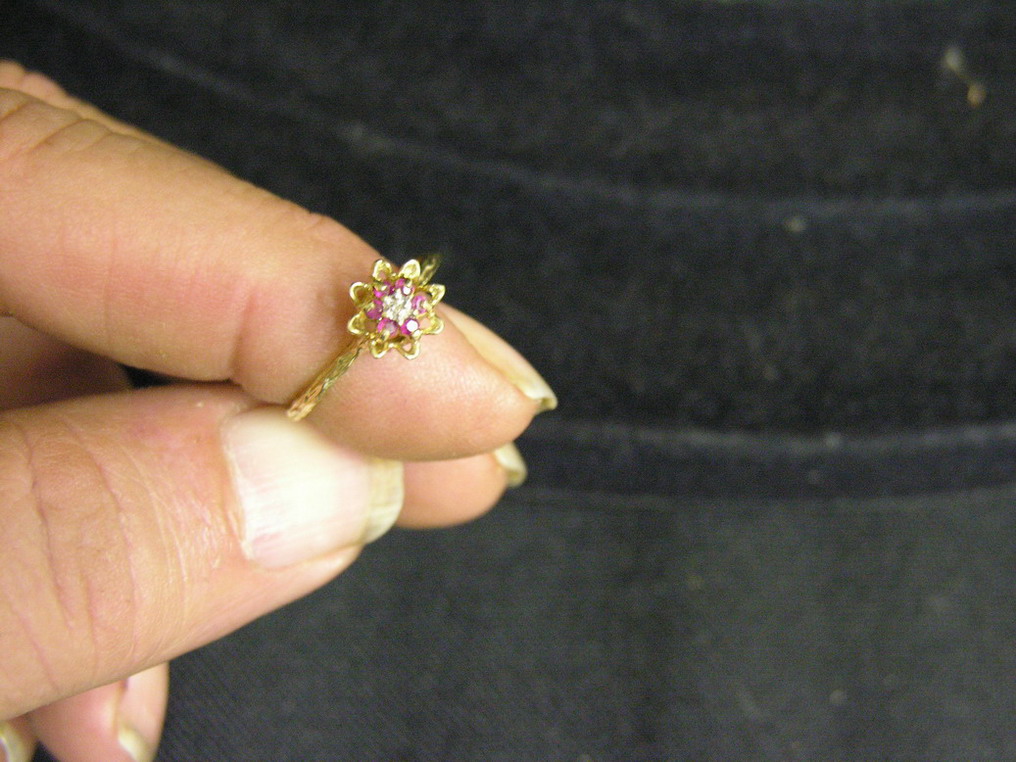 Appraisal: K RING WITH SMALL DIAMONDS AND RUBIES Estate ring Weight