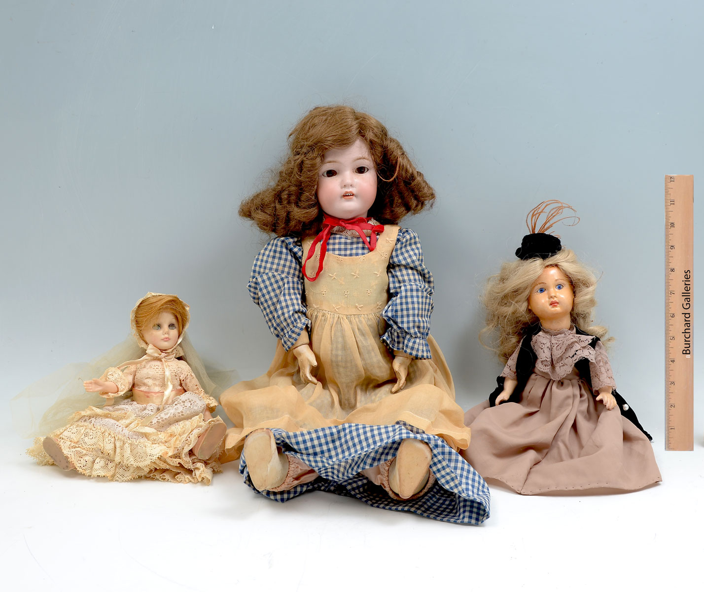 Appraisal: BISQUE DOLL COLLECTION Comprising - Effanbee Bride doll signed at