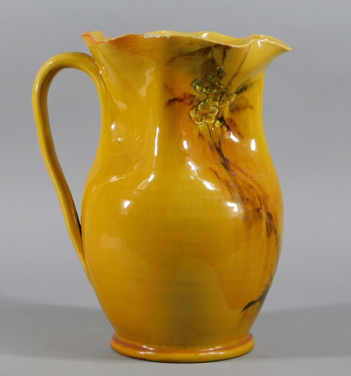 Appraisal: C CONTINENTAL GLAZED POTTERY RUFFLED JUG Europe th CenturyOvoid pinched