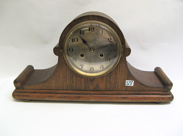 Appraisal: GERMAN OAK CASED MANTEL CLOCK time and strike with key