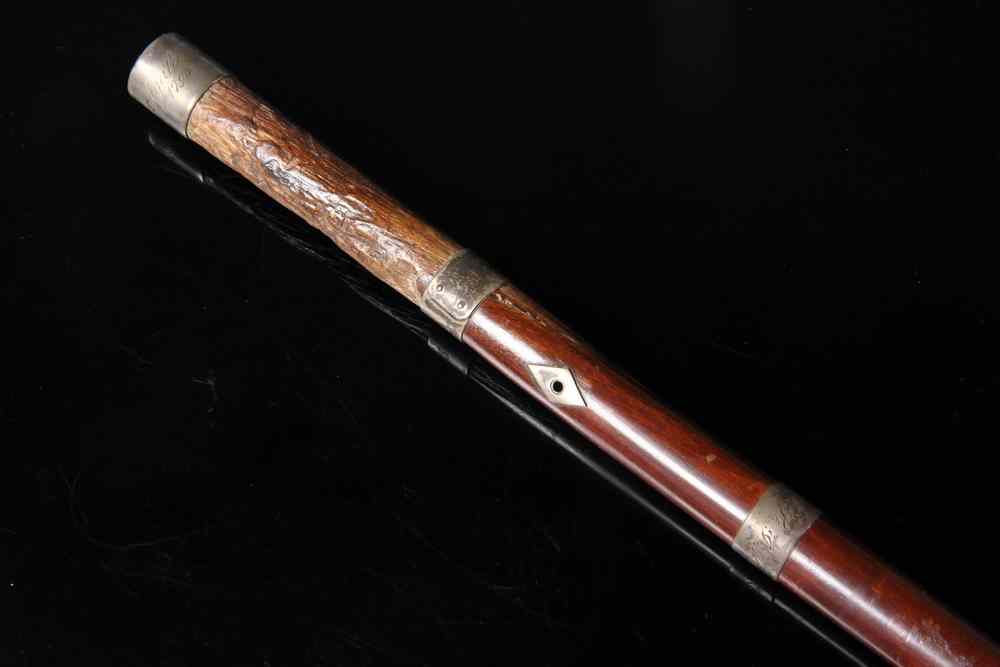 Appraisal: SILVER BOUND SWAGGER STICK- Walnut shaft with silver tip base