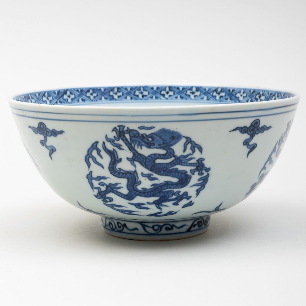 Appraisal: Chinese Blue and White Porcelain Dragon Bowl Psuedo mark to