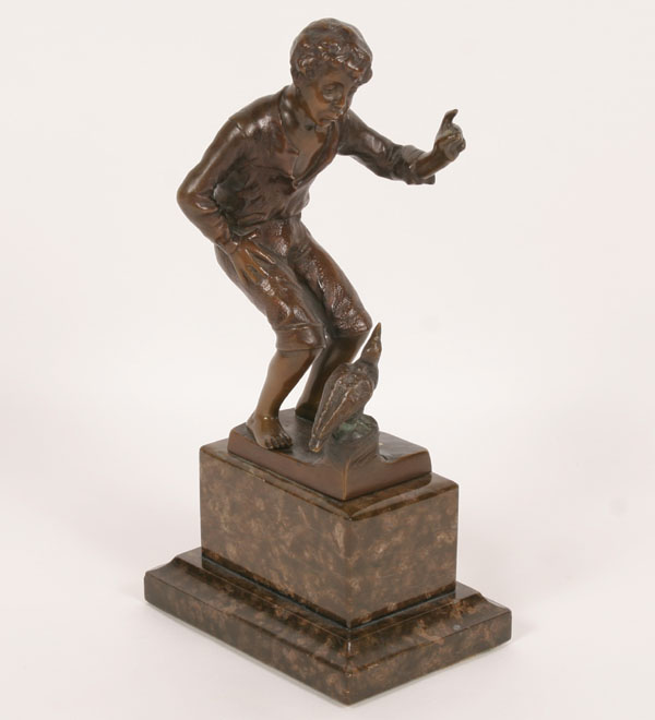 Appraisal: Ernest Beck German th th Century bronze boy giving perched